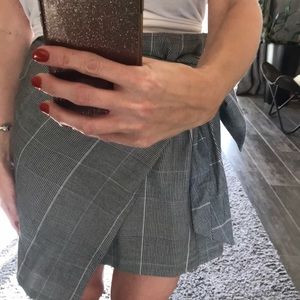 Plaid asymmetrical skirt w/ flattering draping
